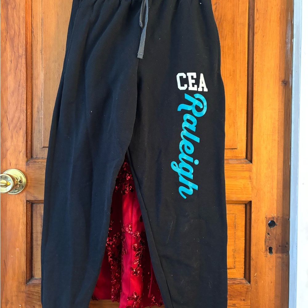 Black Sweatpants with Teal Script Design